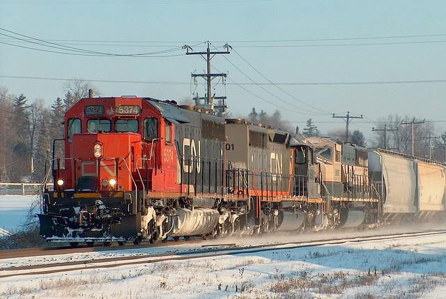 391 with CN 5374 CN and BNSF 9446 Ingersoll Ontario 12-9-05