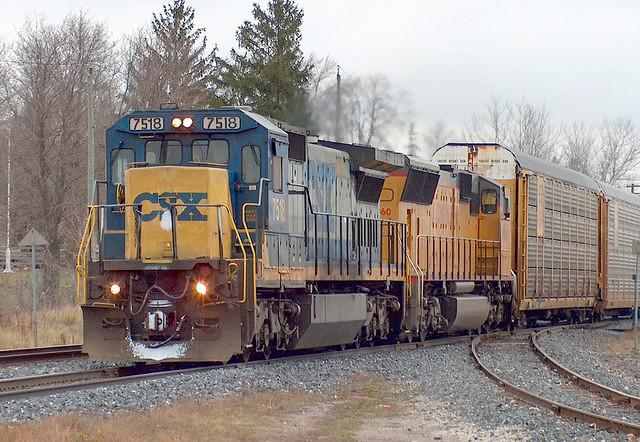 CSX 7518 leads a UP SD70 on 271 Ingersoll Ontario 11-30-05