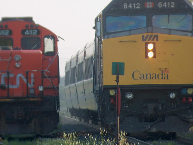 VIA 6412 passes the local switcher approaching the Ingersoll Station