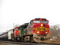 BNSF 787 leads BNSF 7837 and CN 5707 on 394 Ingersoll Ontario 3-22-07