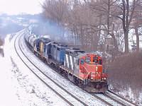 CN 4140 (ex Ingersoll regular) leads Railink 4205 & 4200 out of Paris, through the detector at 61 mph 1-16-05