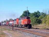 CN 5357 leads BC 4620 through Ingersoll Ontario 9-22-04