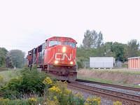 148 with CN5702 and and IC private car through Ingersoll Ontario 9-8-04