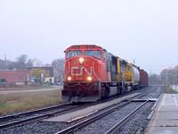 CN 5721 on 385 leads Santa Fe 6308 wb through Ingersoll Ontario 11-2-04