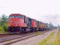 CN 5757 leads 5636 & SF 3185, 2612 & 2416 eb through Woodstock Ontario 8-11-04