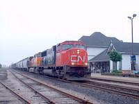 CN 5766 leads a BNSF unit westbound, Woodstock Mile 94.6 Dundas Sub 6/18/04