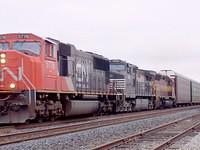 CN 5776 leads NS 8955 and WC 6618 eb through Ingersoll 10-25-04