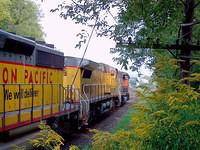 CN 9449 leads a pair of UP units eb through Woodstock Ontario 9-13-04