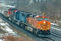 BNSF 5025 leads NREX 8695 and CN 2577 on 394 through Woodstock Ontario 1-02-06