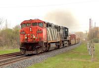 CN 2410 leads NS 9632 on 149 through Ingersoll Ontario 4-22-06