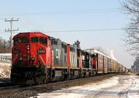 CN 2453 leads CN 2429. NS 1641 and CN 5333 on 385 with about 170 cars 2-21-07