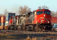CN 2537 leads a NREX unit on 148 through Ingersoll Ontario 1-12-06
