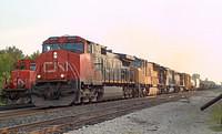 CN 2624 leads UP 4908, IC 6050 and CN/WC XXXX on 390 Ingersoll Ontario 5-27-06