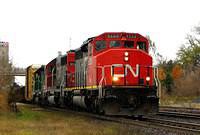 CN 5289 leads IC 6117 and BNSF 2108 on 394 Woodstock Ontario 10-29-058