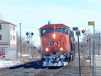 CN 5600 leads a CSX unit through Ingersoll Ontario 3-14-05