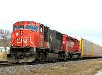 CN 5613 leads CP 5720 SD40 on 271 Ingersoll Ontario 3-30-07