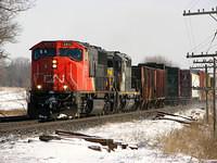 CN 5615 leads ex GTW 5948 on 391 Beachville Ontario 2-7-07