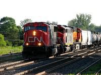 CN 5645 leads 331 with BNSF 7739 as the third unit Ingersoll Ontario 6-30-07
