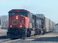 CN 5700 leads Montana Railink 307 on 271 Ingersoll Ontario 3-29-05