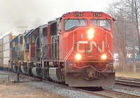 CN 5764 leads 390 with 2 CSX units trailing Ingersoll Ontario 11-21-05