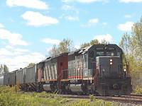 CN/WC 6911 leads 398 through Ingersoll Ontario 5-20-06
