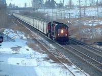 GCFX 6035 leads an eb that looks almost like a unit train through Beachville Ontario 2-13-05