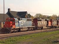 GTW 5933 leads CN 5361 & 7054 on 435 Ingersoll Ontario 4-24-06