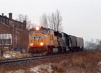 UP 4392 leads NS 6665 on 327 through Ingersoll Ontario 1-02-06