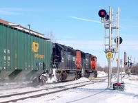 CN 5779 SD76I leads IC Operation Lifesaver 6257 SD40-2 through Ingersoll 1/23/04
