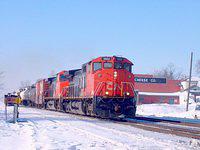 CN 2502 leads a very long freight through Ingersoll Ontario 2/11/04