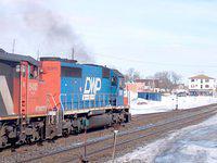 A smoking DWP 5911 SD40 leads a dimentional through Ingersoll 2/16/04