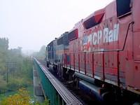 CP 142 heads out of Woodstock Ontario 9-10-02