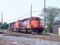CN 6014 leads CP 8538 and CEFX 123 into Woodstock, Mile 89.0 Galt sub 6/30/04