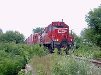 CP 1605 has just picked up OSR's empties and heads to Woodstock. St Thomas sub Mile 8.9 7-30-04
