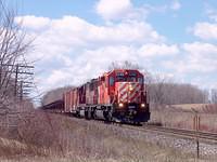 CP 5755 SD40 leads SOO 6053 SD60 eastbound with the CWR train, Galt Sub. Mile 95.4 4/14/04