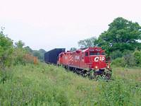 CP 8208 leds 8248 on 141 this morning with 15 cars. Ingersoll Ontario, St Thomas sub mile 7.5 7-27-04