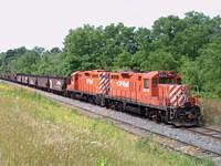 CP 8214 and 8234 sits tied down on the Beachville siding, St Thomas sub Mile 4.0 7/22/04