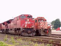 CP 9303 SD90MAC passes 1618 and shows its size. 6/18/04 Woodstock Mile 89 Galt Sub