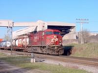 CP 9513 leads a long "stack" train westbound through Zorra 5/5/04