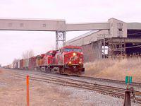 CP 9569 leads 8523 and a UP unit west through Zorra Mile 94.7 Galt Sub 3/15/04