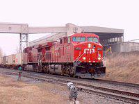 Caught CP 9772 (2003) and 9503 (1995) AC4400's westbound through Zorra 14:20 4/1/04. They sure look different after 8 years