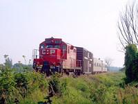 CP 8218 leads the Tech train wb on the St Thomas sub, Ingersoll Mile 11 7/21/04