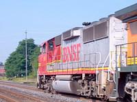 BNSF 101 SD60 War Bonnet leads a Heritage BNSF 579 unit on 327 Ingersoll Ontario 9-3-04