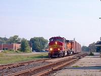BNSF 101 SD60 War Bonnet leads 579 in Heritage colors on 327 Ingersoll Ontario 9-3-04