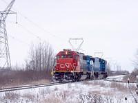 NS 327 heading back to St Thomas Ontario with Conrail 6721 and CN/IC 6123 1-5-05