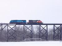 NS 327 on the Wabash trestle in St Thomas Ontario with Conrail 6721 and CN/IC 6123 1-5-05