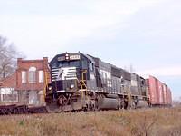 NS 6689 SD60 leads 5423 SD50 and 21 cars on 327 through Ingersoll Ontario 11-10-04