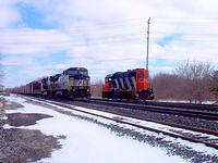 NS 8334 leads 327 through Ingersoll 3/13/04