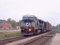 NS 8435 (ex Conrail 6257) sporting the low numbers boards leads 327 through Ingersoll Ontario 9-28-04