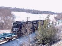 NS 8889 C40-9W leads 8764 C40-9 on 327 through Ingersoll Ontario time 11:08 1-14-05